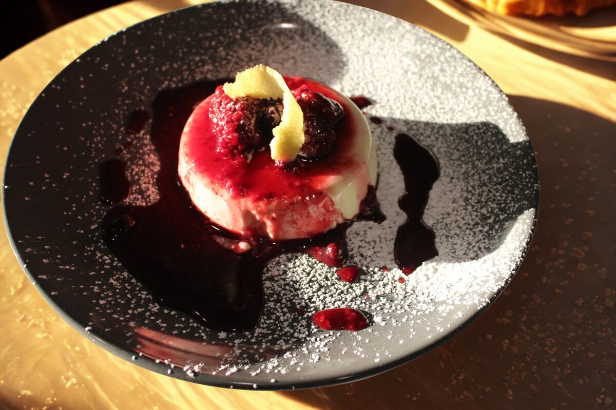 Panna cotta topped with berries